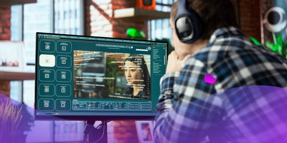 An employee using a professional video editing platform in a modern office setting.