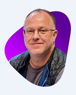 Innervate VP of Professional Services headshot in white shirt